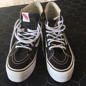 Vans Black and White High-Top Sneakers